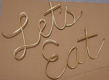 Load image into Gallery viewer, Wire Lets eat wall sign
