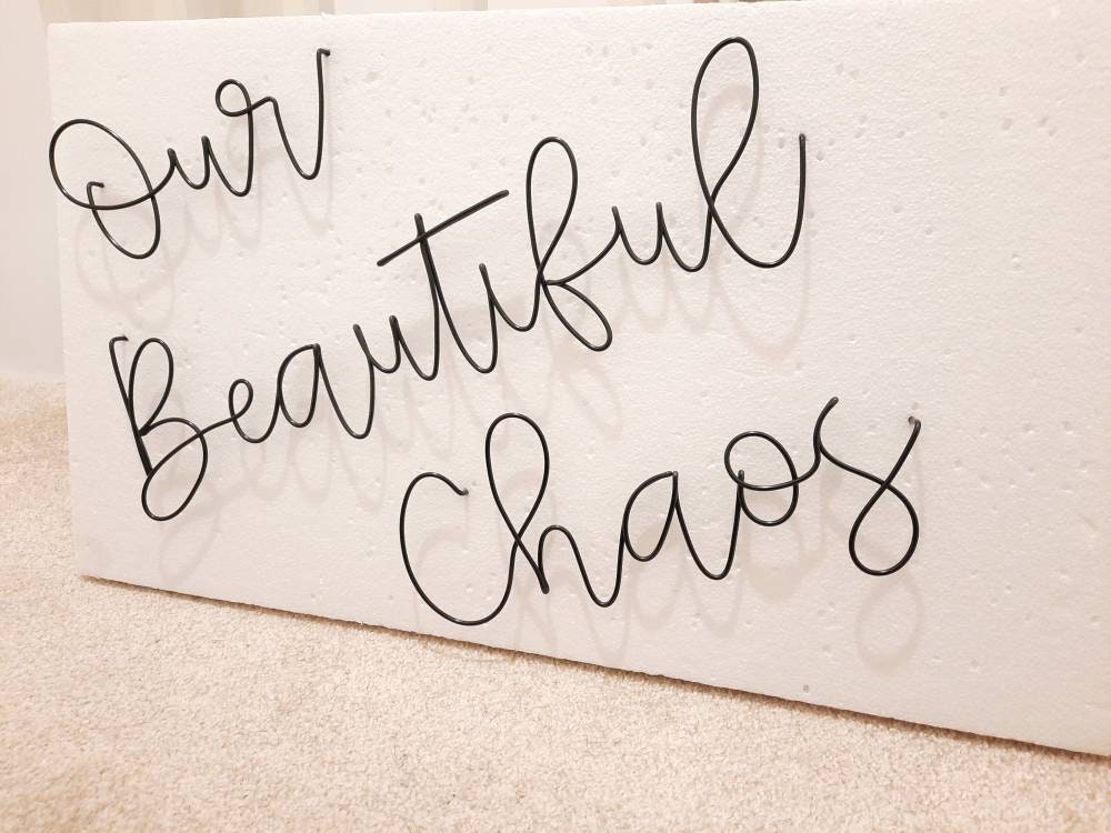 Wire Our Beautiful Chaos wall sign